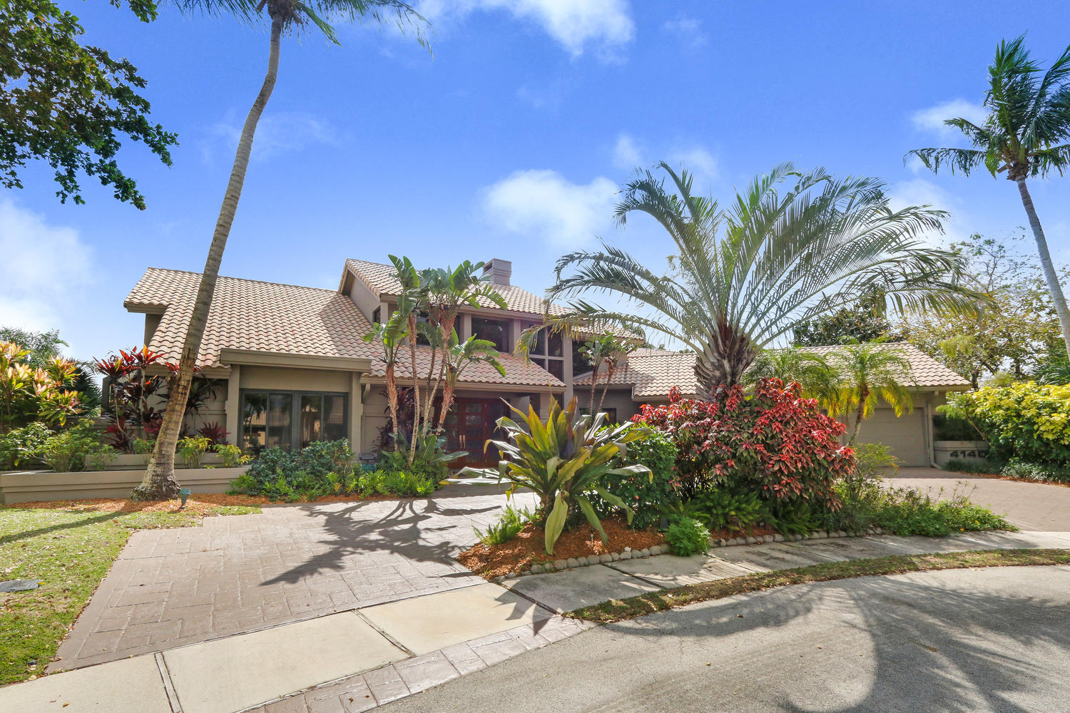 4140 Georges Way Boca Raton, FL 33434 - Photo 3 of 37 Beautiful Landscaping and Circular Drive