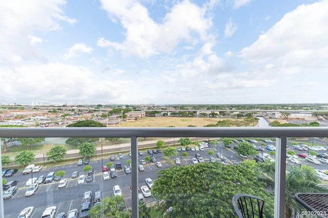 a view of a city skyline from a balcony