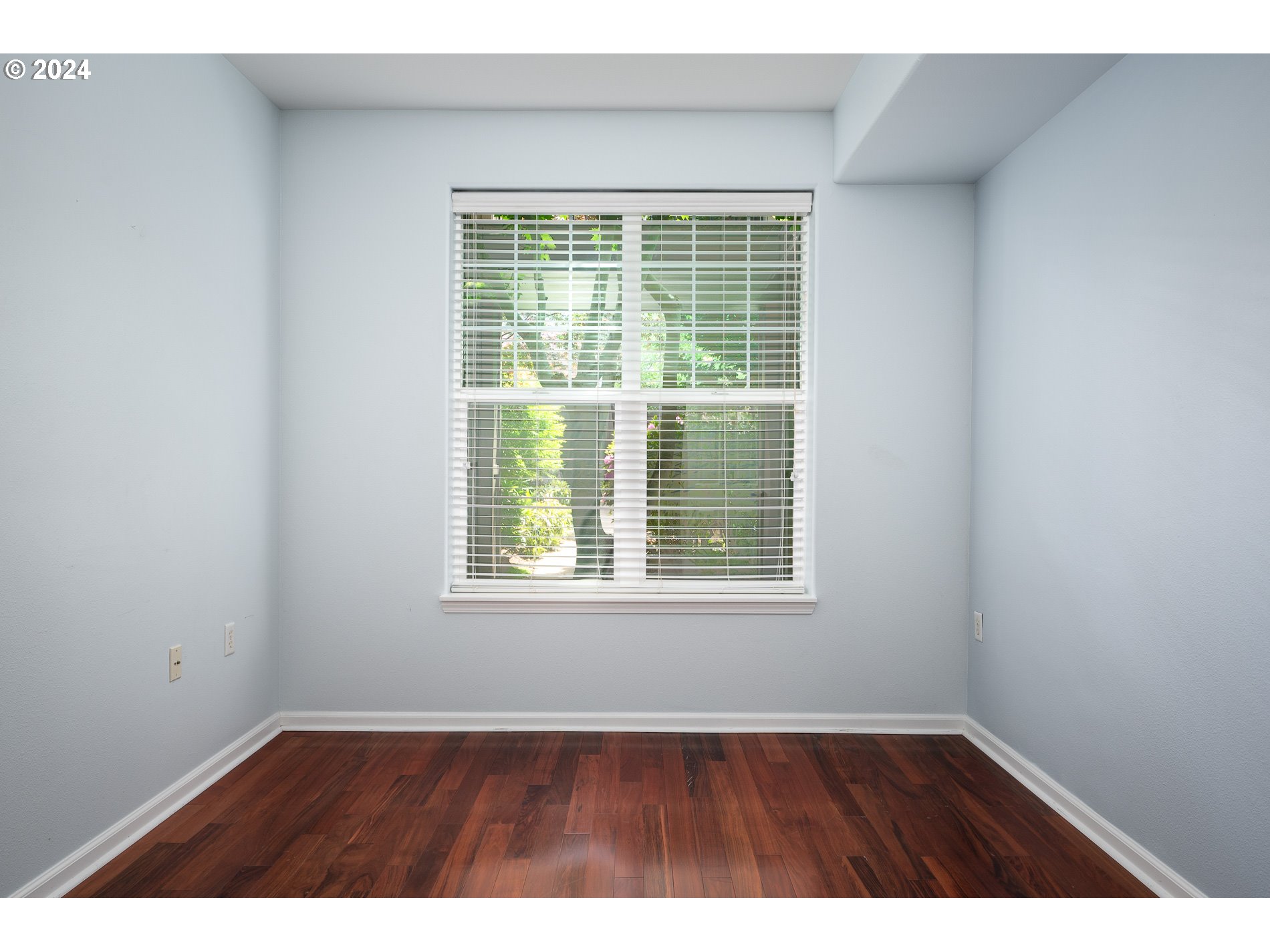 2395 Snowberry Ridge Court West Linn, OR 97068 - Photo 20 of 37 an empty room with wooden floor and windows