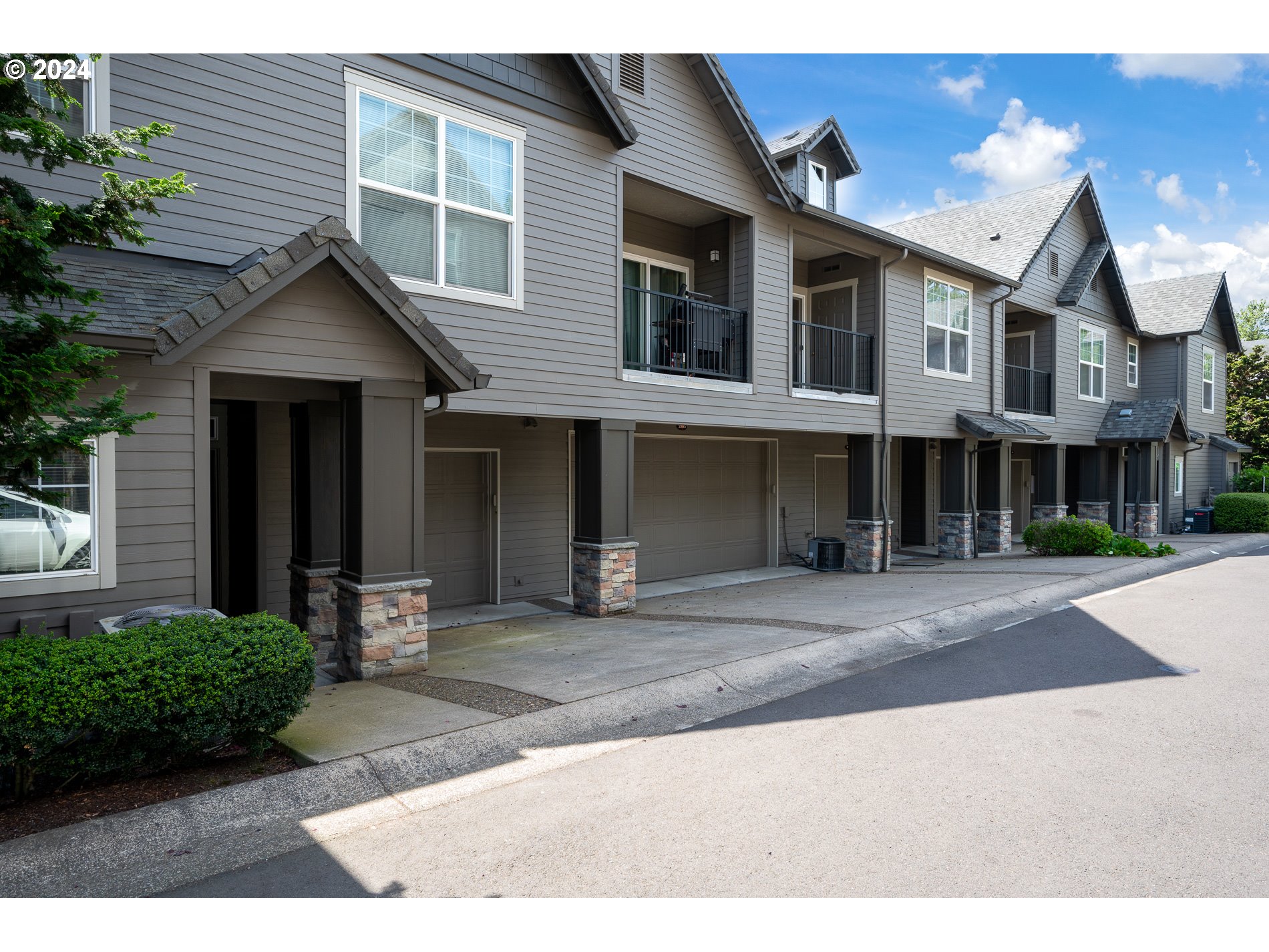 2395 Snowberry Ridge Court West Linn, OR 97068 - Photo 29 of 37 a front view of a house with a yard