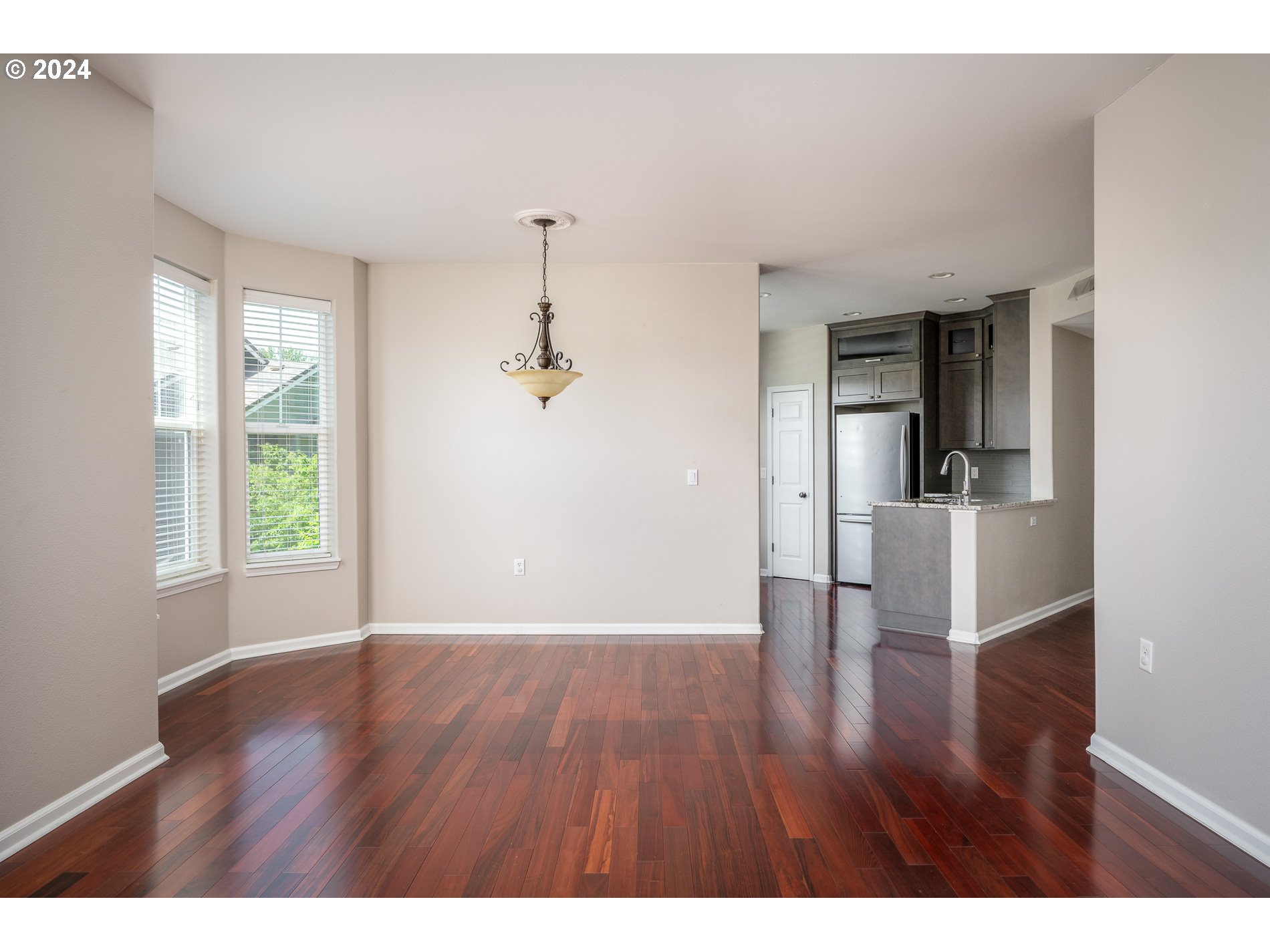 2395 Snowberry Ridge Court West Linn, OR 97068 - Photo 3 of 37 a view of empty room with wooden floor and fan