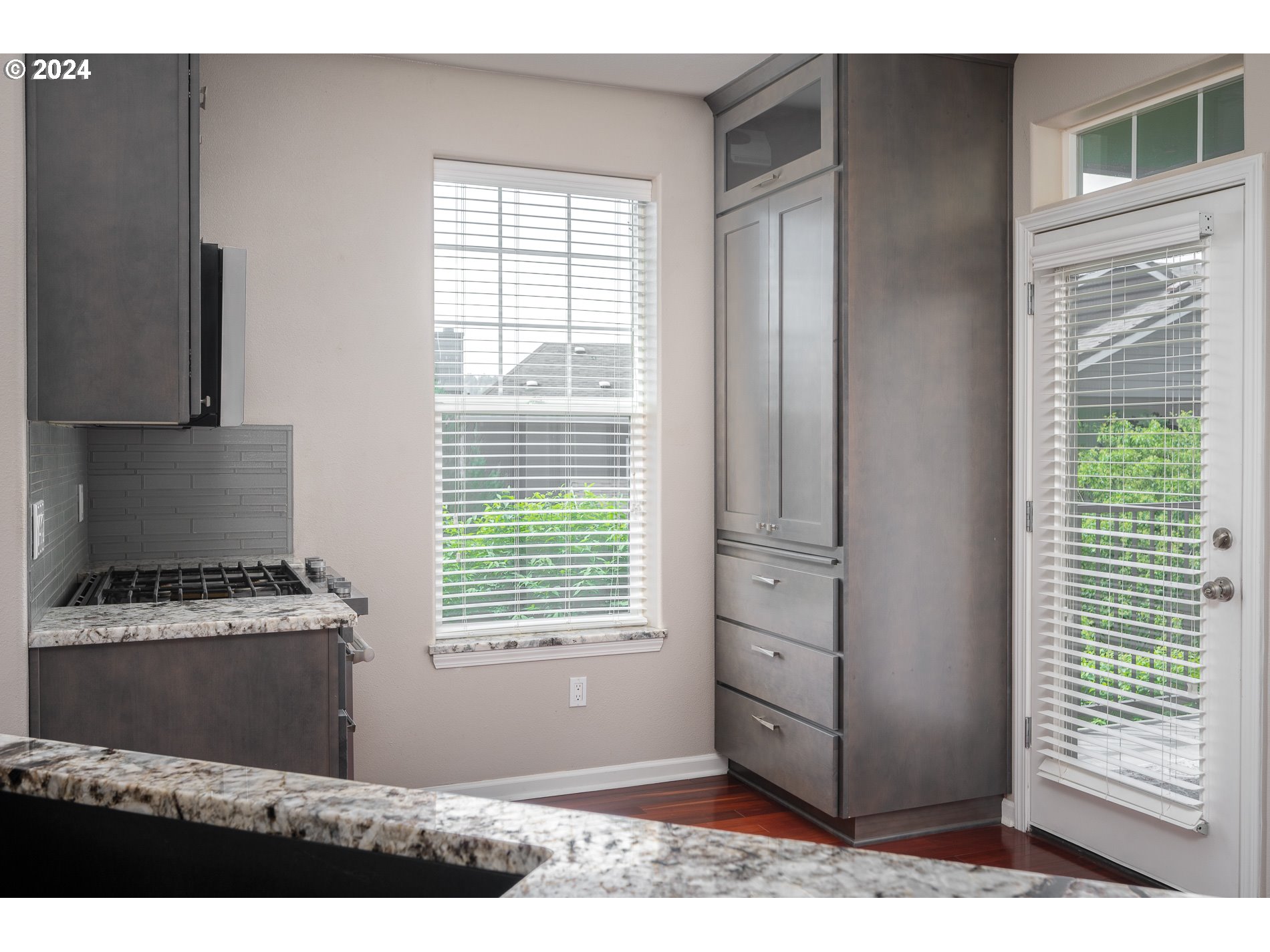 2395 Snowberry Ridge Court West Linn, OR 97068 - Photo 10 of 37 a kitchen with windows and cabinets