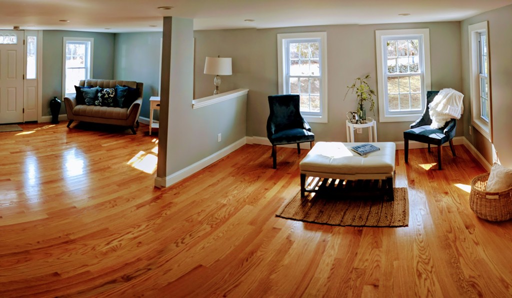 396 Reed Road Dartmouth, MA 02747 - Photo 6 of 13 a living room with furniture and a wooden floor