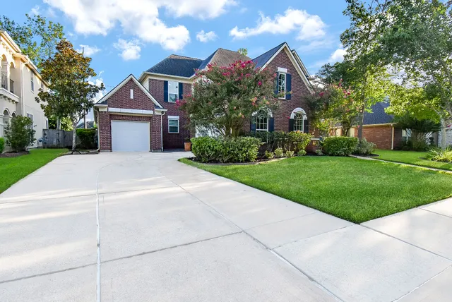 a front view of a house with a porch
