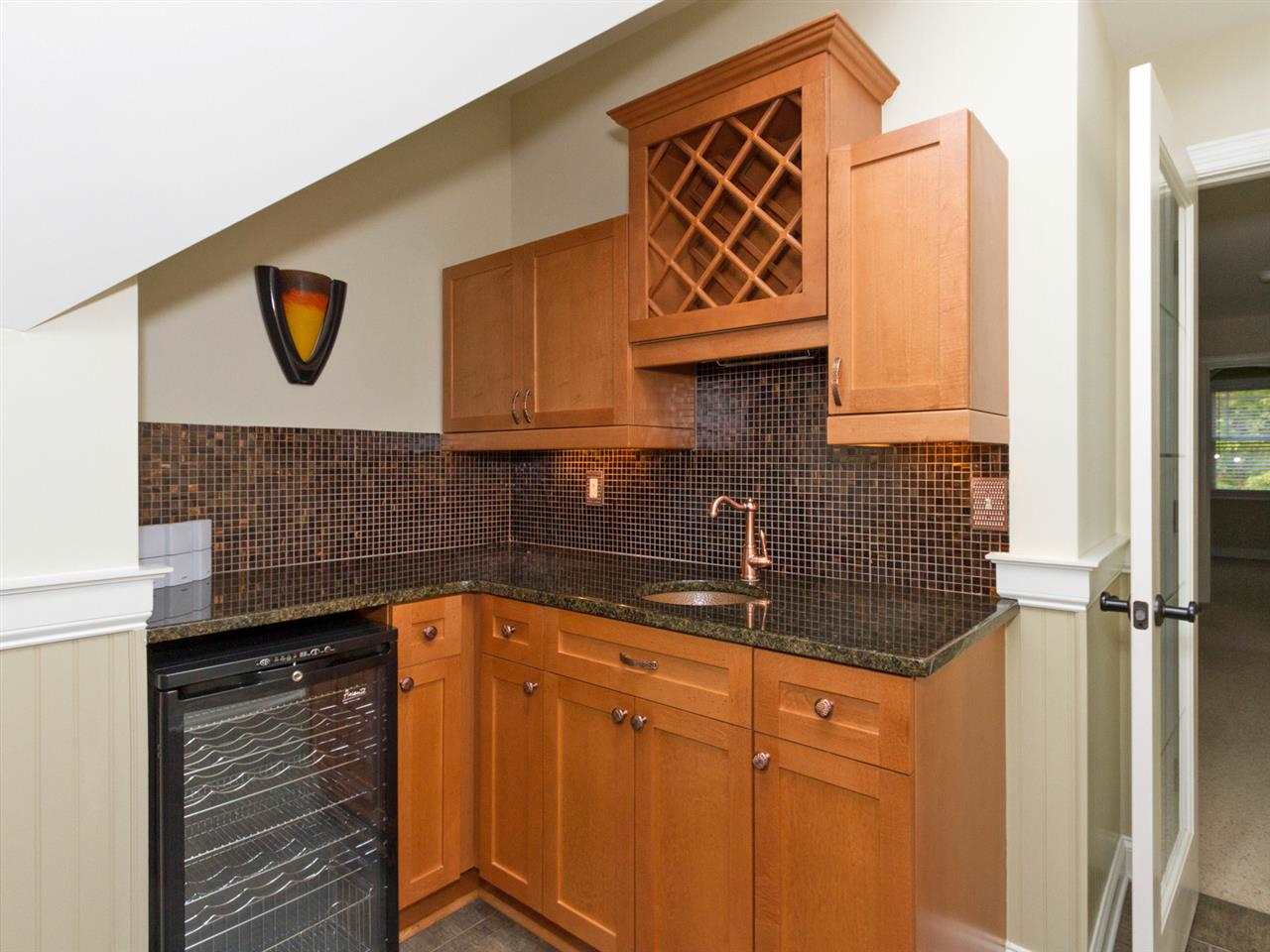 7220 Sparhawk Road Wake Forest, NC 27587 - Photo 16 of 25 Entertaining is Easy with the Wet Bar and Wine Refrigerator in the Bonus Room