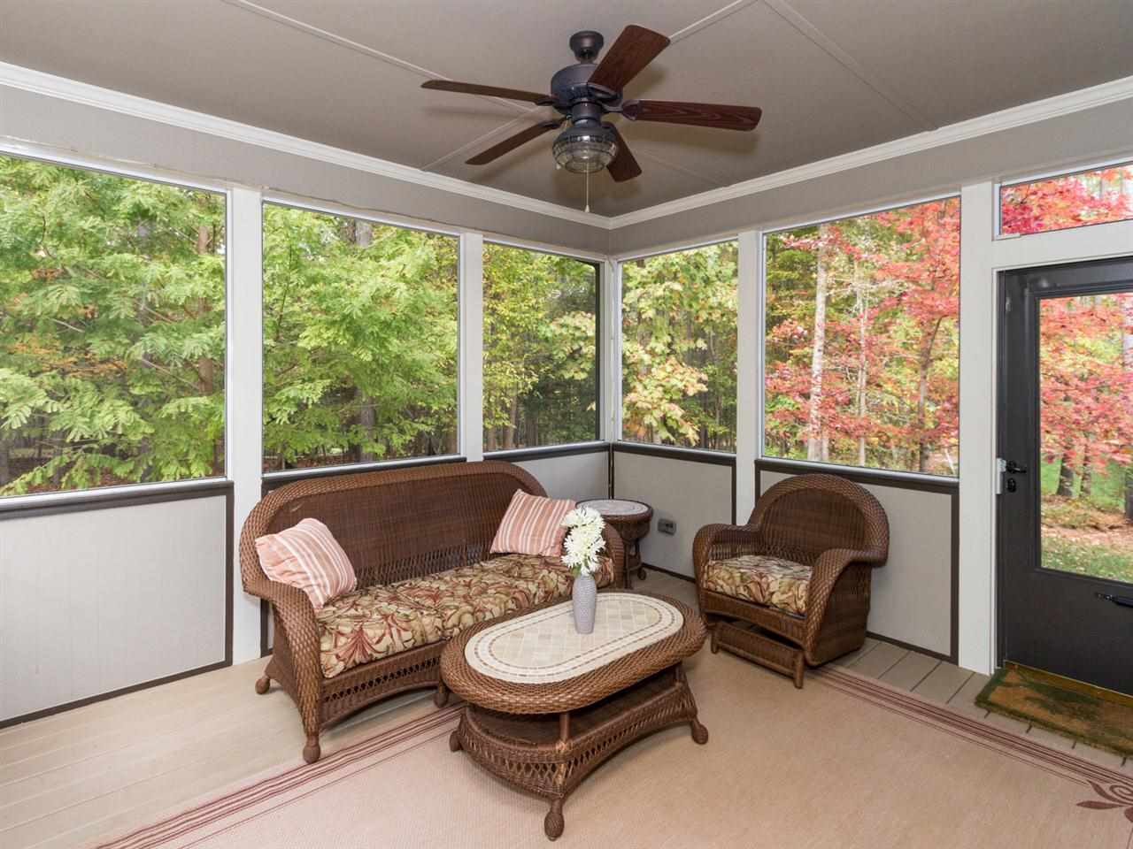 7220 Sparhawk Road Wake Forest, NC 27587 - Photo 18 of 25 Relax on the Screened Porch