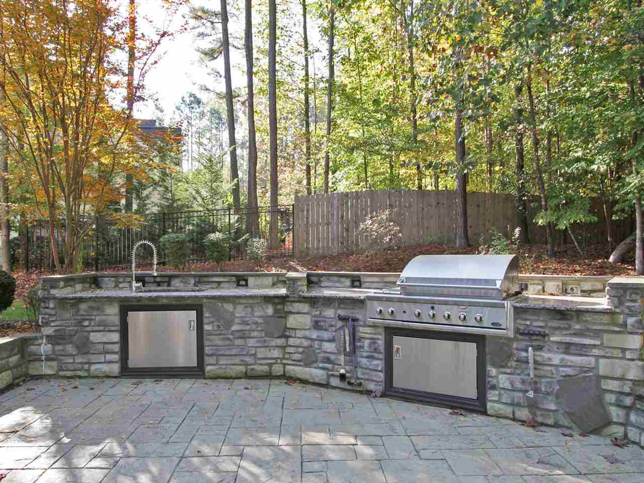 7220 Sparhawk Road Wake Forest, NC 27587 - Photo 19 of 25 Built-In Sink and Gas Grill Make for Ideal Outdoor Living