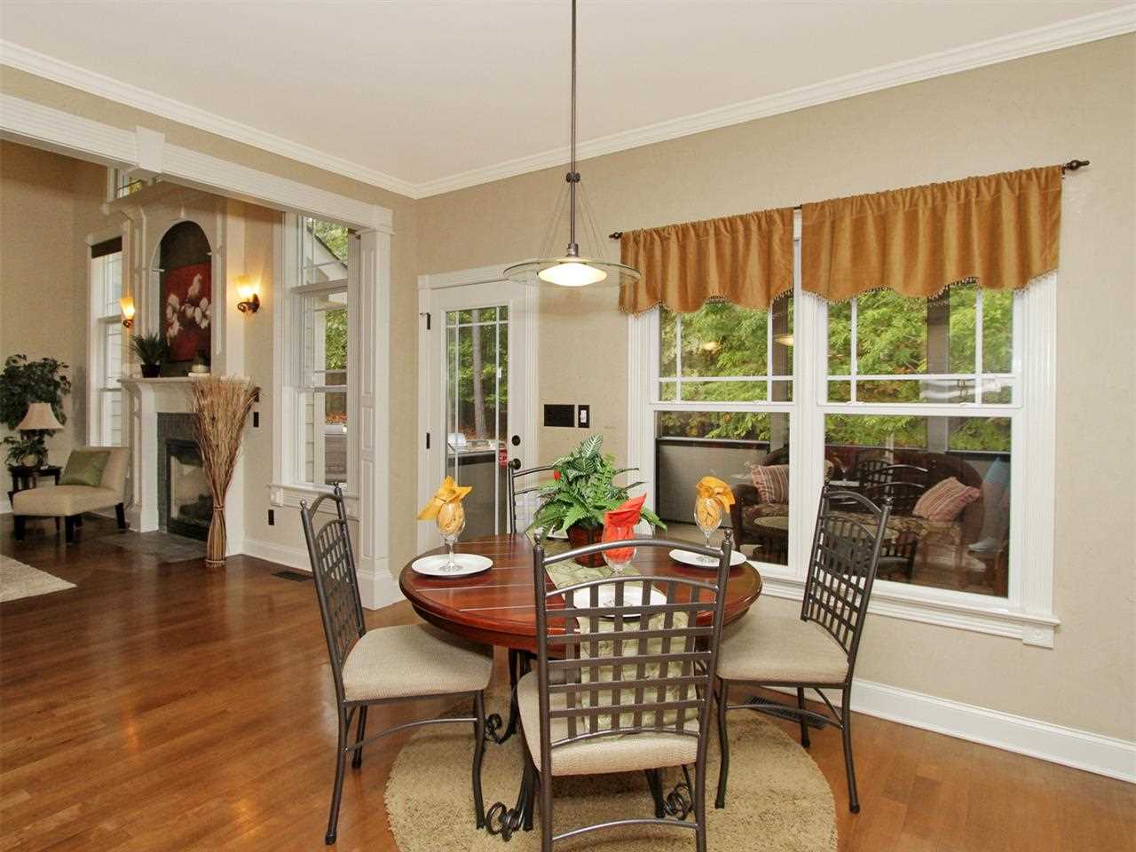 7220 Sparhawk Road Wake Forest, NC 27587 - Photo 5 of 25 Breakfast Room Opens to Family Room and Overlooks the Screened Porch