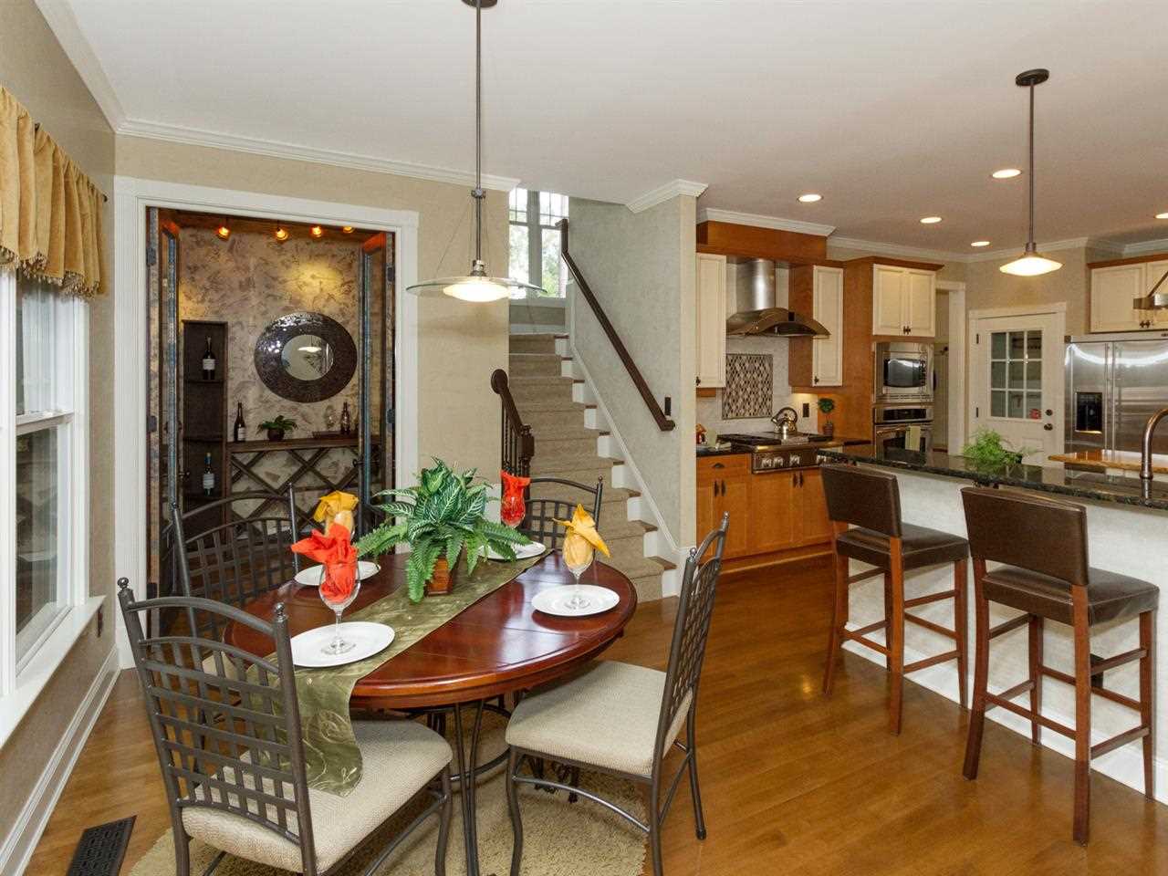 7220 Sparhawk Road Wake Forest, NC 27587 - Photo 6 of 25 Raised Breakfast Bar and Convenient Back Staircase
