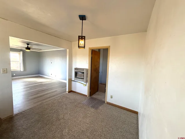 a view of a kitchen with a sink and dishwasher