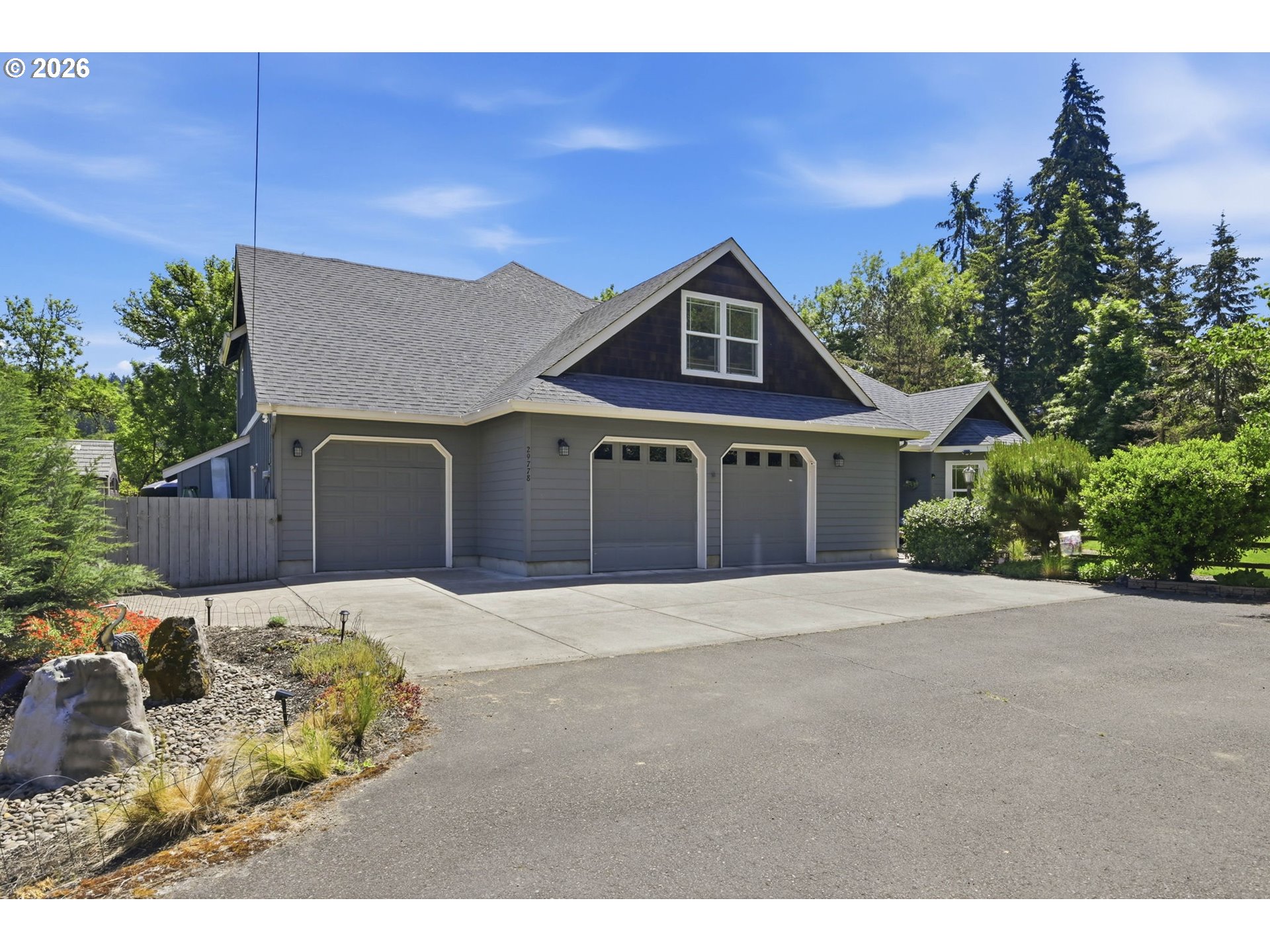 29778 Gimpl Hill Road Eugene, OR 97405 - Photo 5 of 43 a front view of a house with a yard