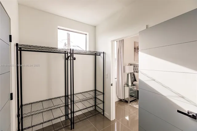 a view of hallway with washer and dryer