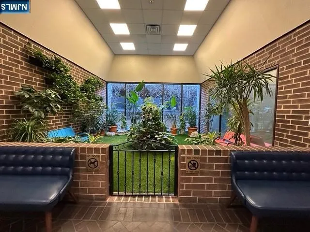 a view of hallway with a couch