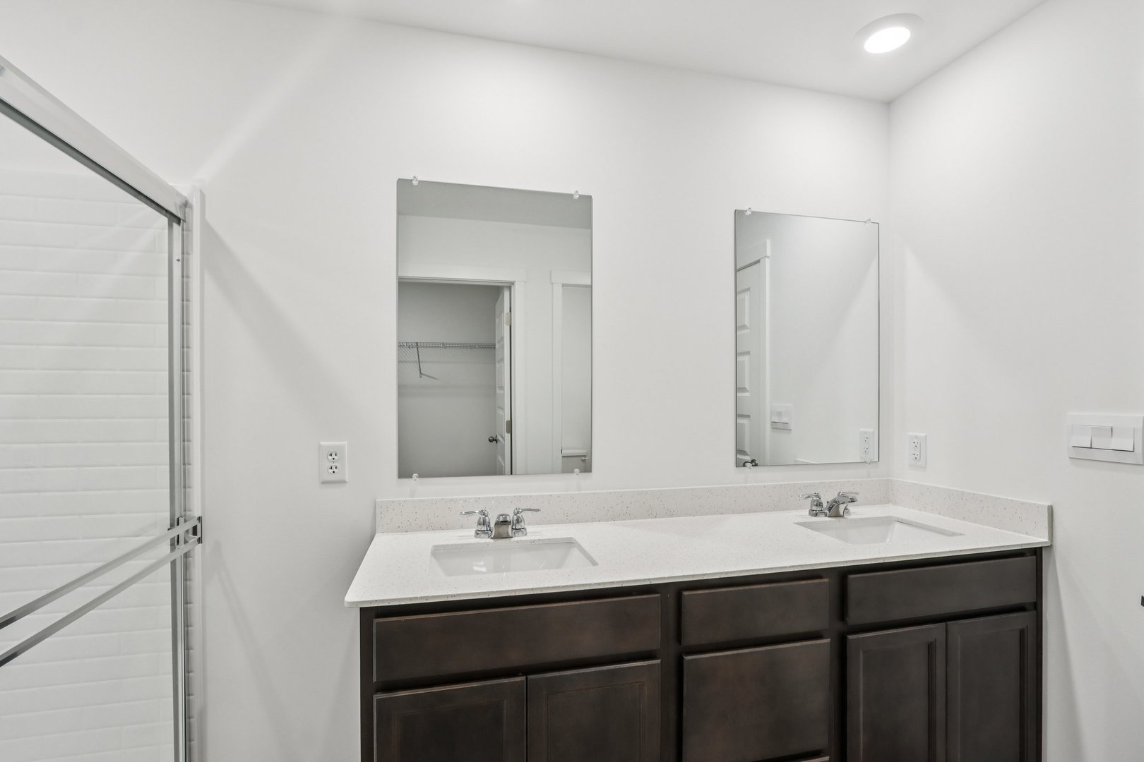 6715 Applegate Drive Plainfield, IL 60586 - Photo 26 of 27 a bathroom with 2 sink and a mirror