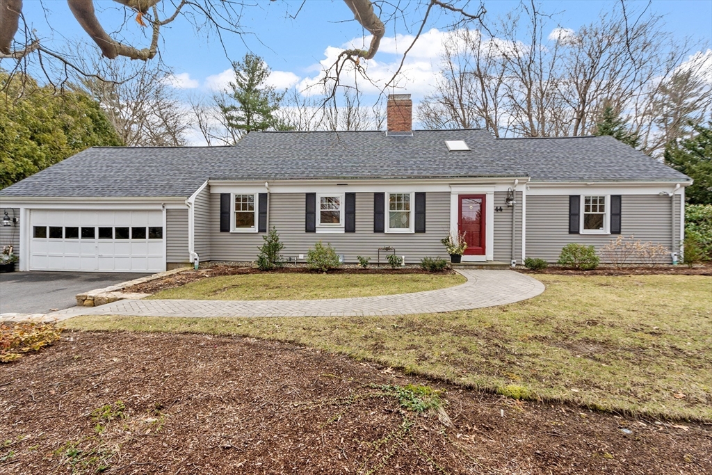 44 Martin Road Concord, MA 01742 - Photo 1 of 1 a view of a house with a yard covered with snow in front of house