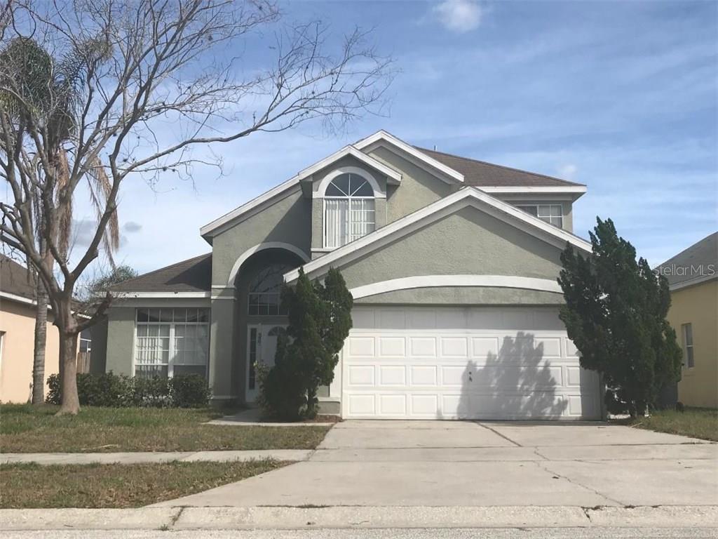 337 Riggs Circle Davenport, FL 33897 - Photo 1 of 1 a view of a house with a yard