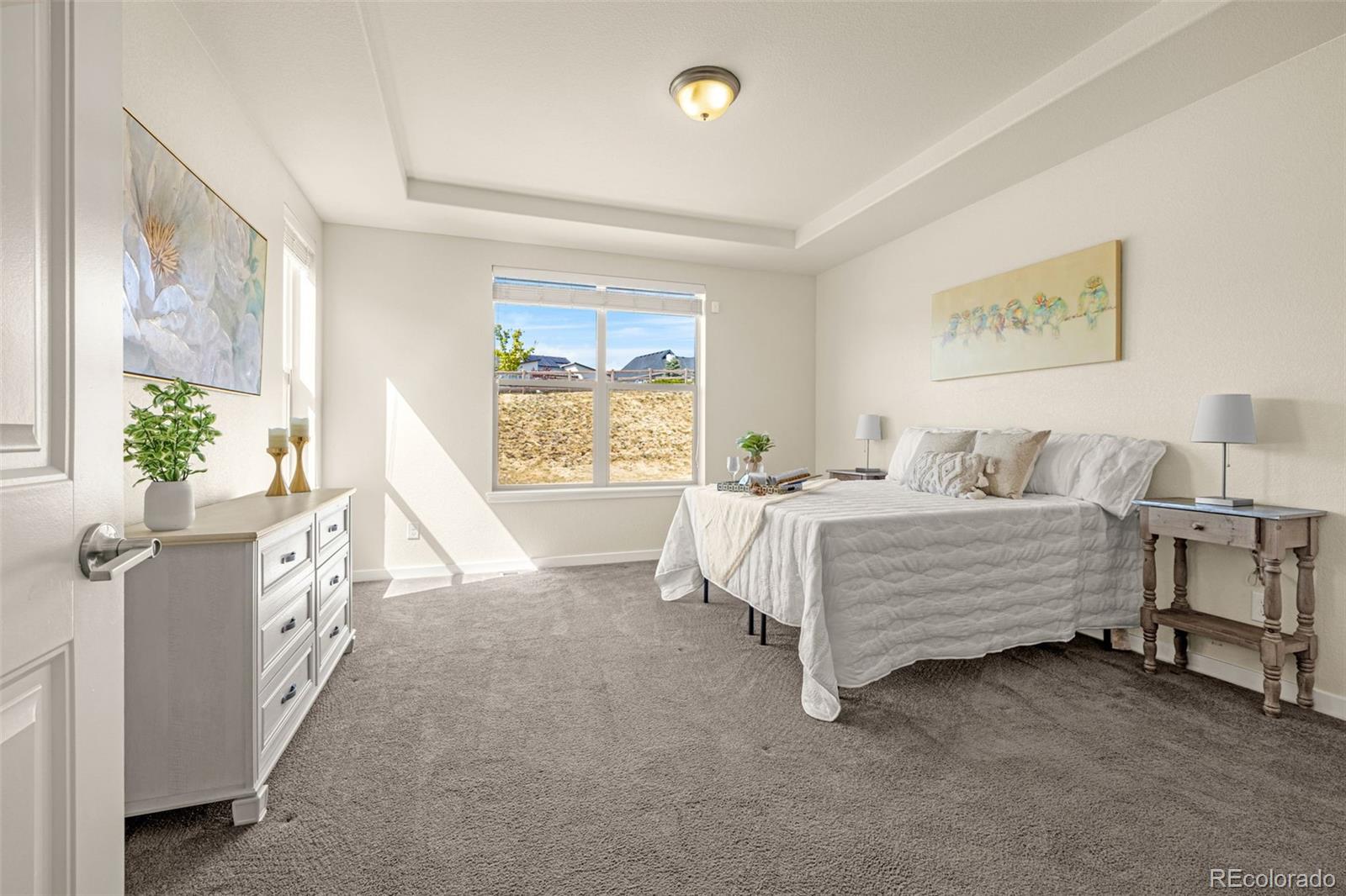 2052 Ruffino Drive Colorado Springs, CO 80921 - Photo 11 of 36 a bed room with a bed and a window