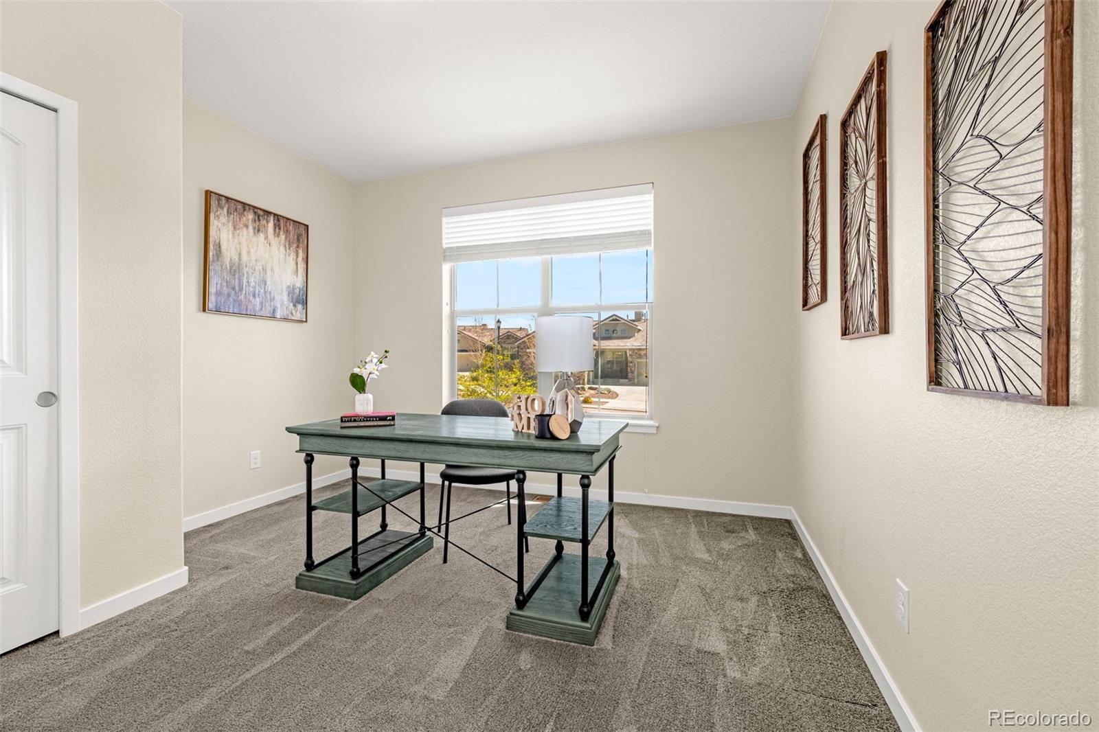 2052 Ruffino Drive Colorado Springs, CO 80921 - Photo 19 of 36 a view of a workspace with furniture