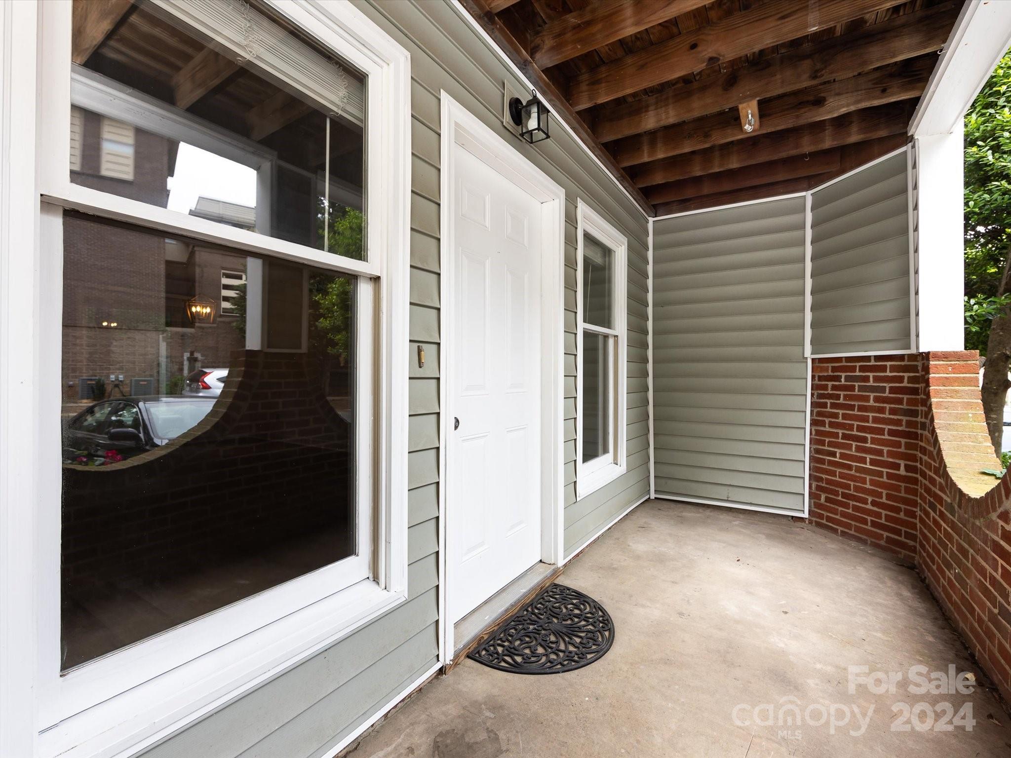 430 Queens Road, Unit 112 Charlotte, NC 28207 - Photo 18 of 19 a view of a door of the house