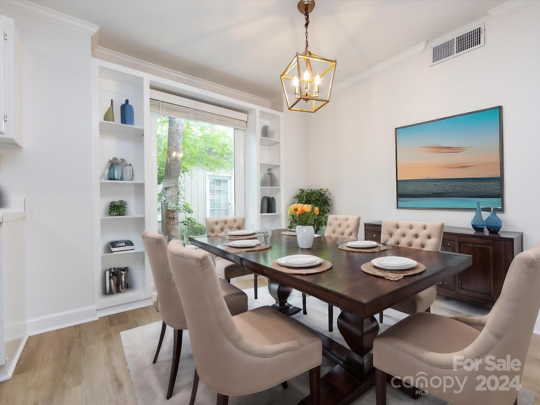 430 Queens Road, Unit 112 Charlotte, NC 28207 - Photo 7 of 19 a view of a dining room with furniture window and outside view