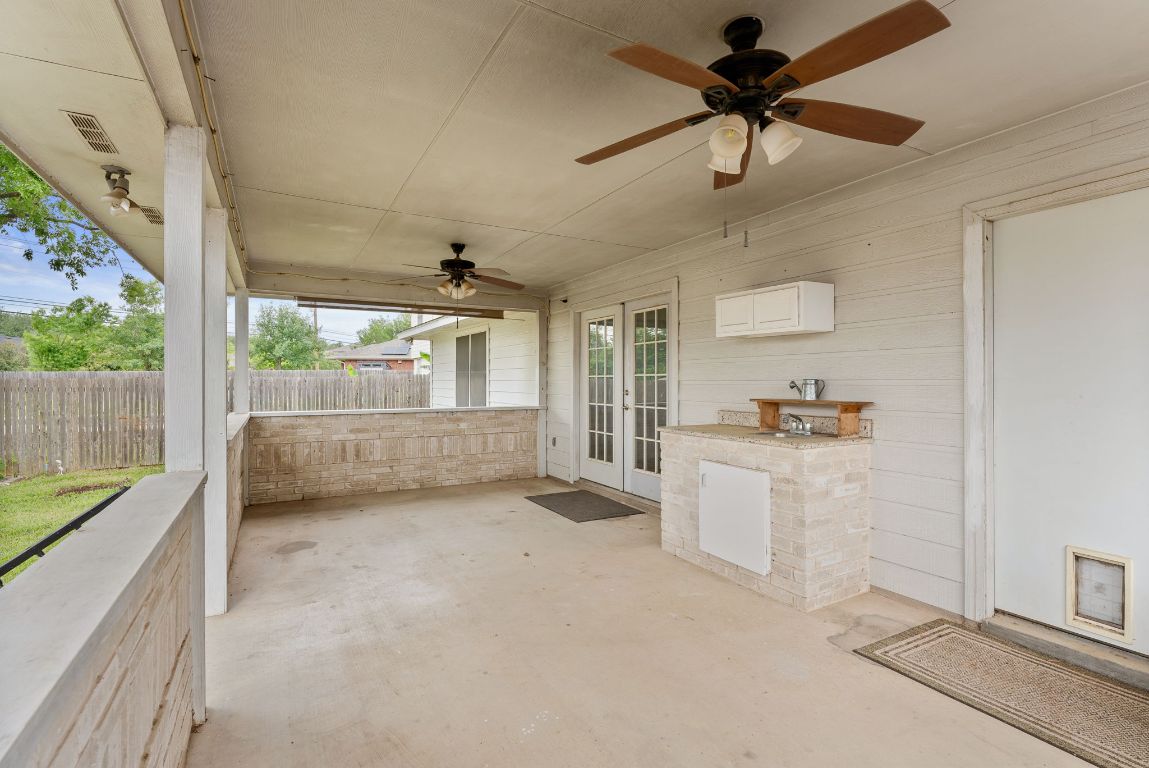 1564 Lorson Loop Round Rock, TX 78665 - Photo 22 of 27 View of patio with ceiling fan and french doors