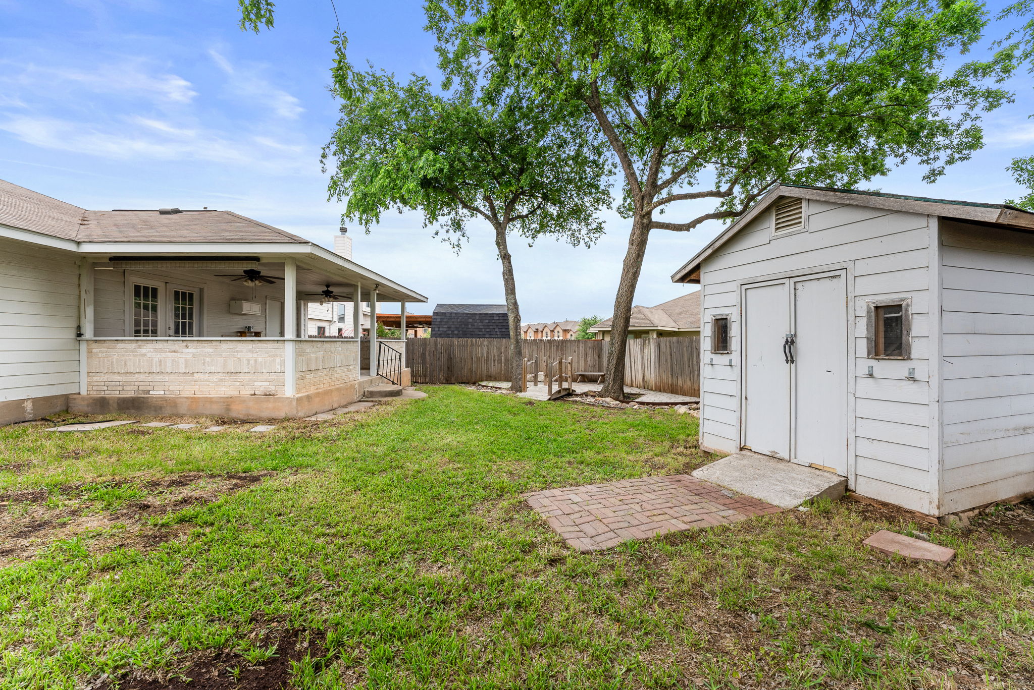 1564 Lorson Loop Round Rock, TX 78665 - Photo 25 of 27 a front view of a house with yard and green space