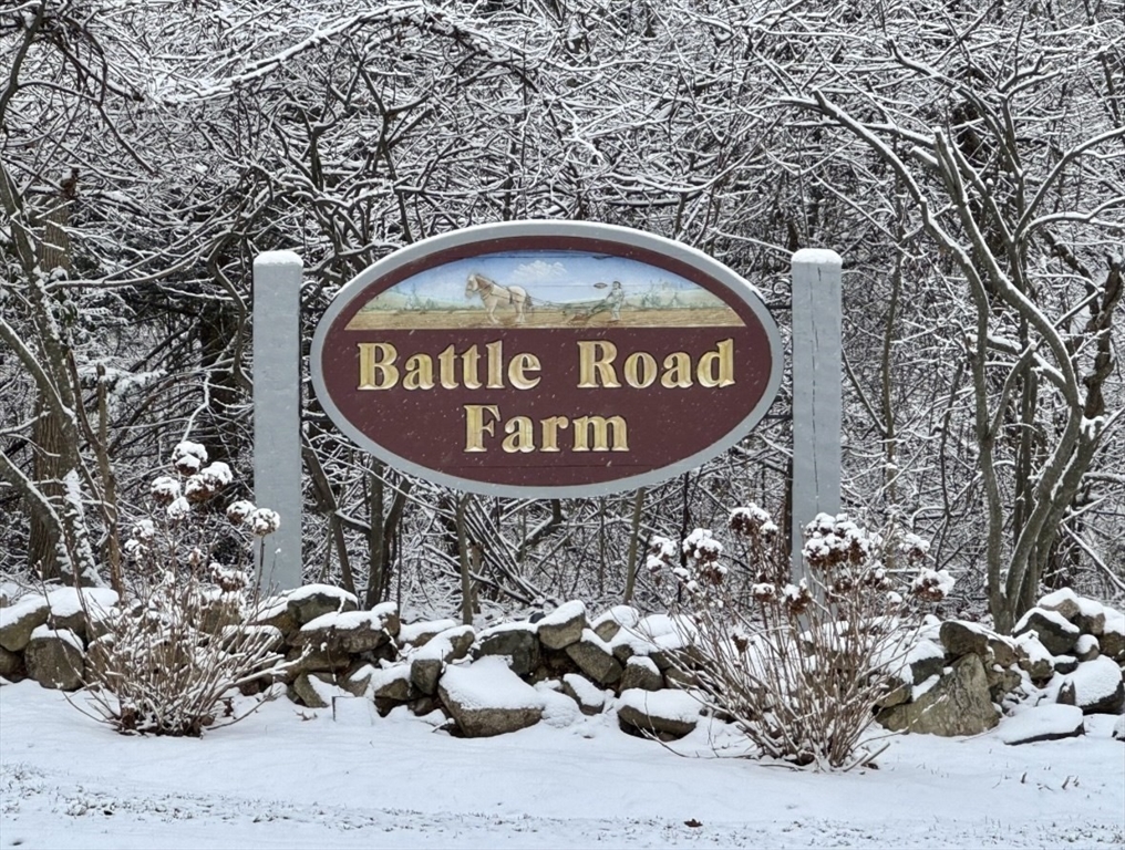 29d S Commons, Unit D Lincoln, MA 01773 - Photo 28 of 36 a sign on the side of the road