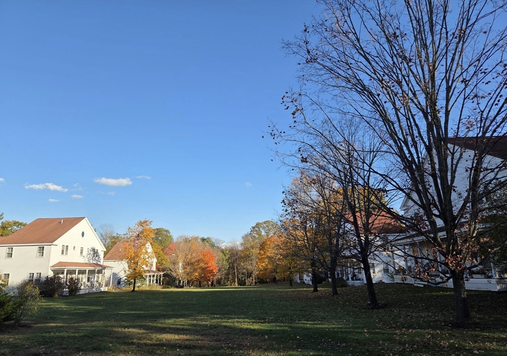 29d S Commons, Unit D Lincoln, MA 01773 - Photo 32 of 36 a view of an outdoor space and yard