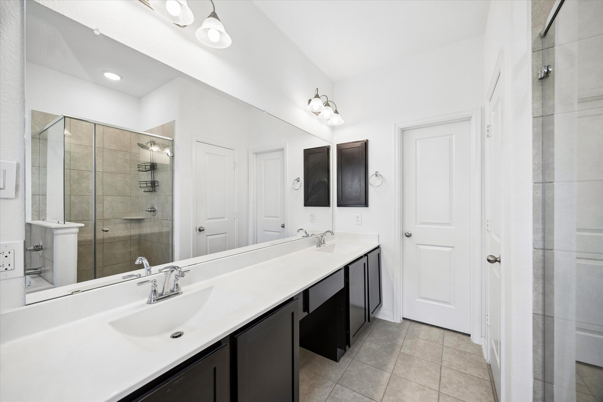 3354 Harmony View Lane Spring, TX 77386 - Photo 6 of 18 a bathroom with a double vanity sink mirror and double
