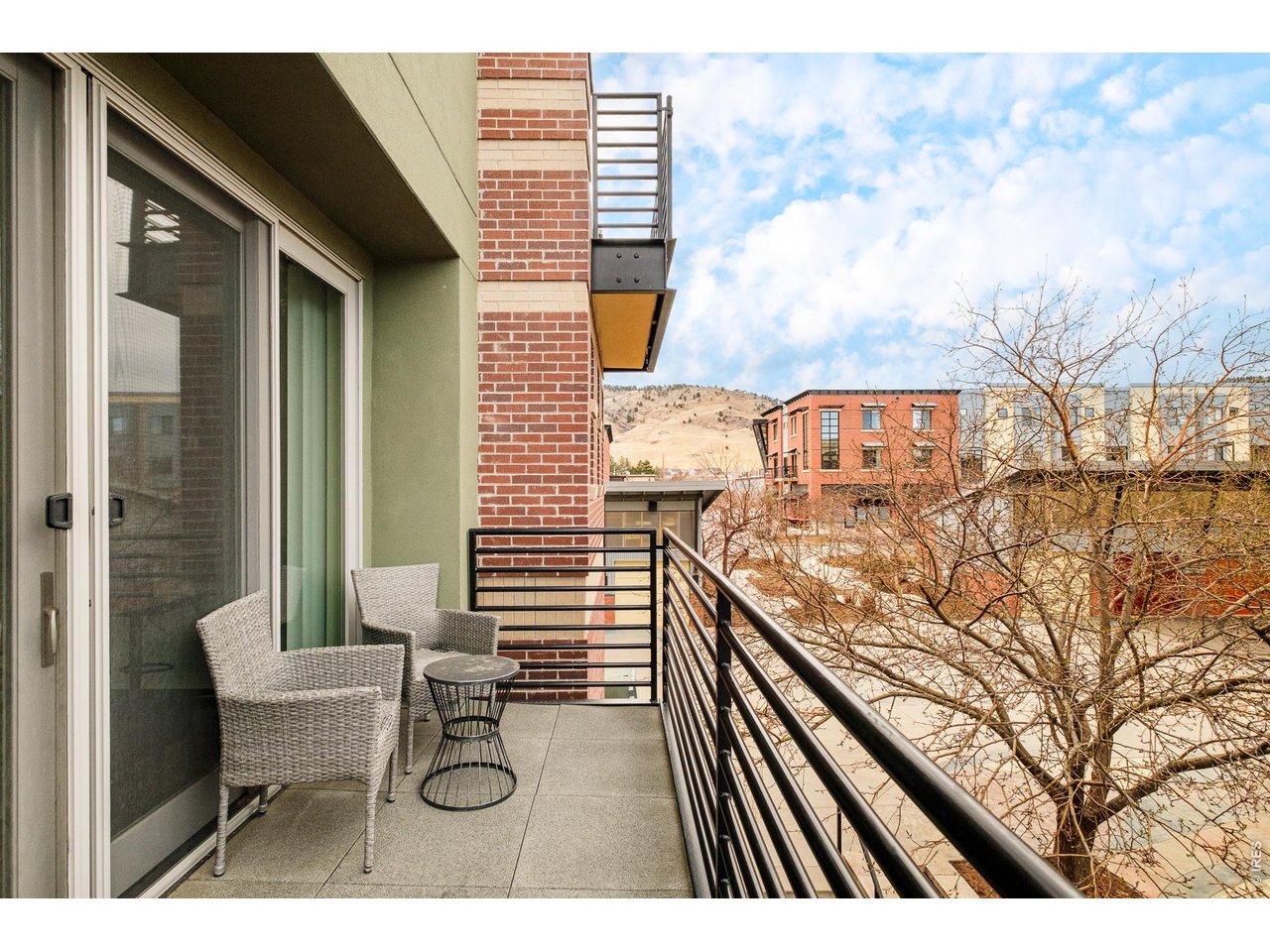 4555 13th Street, Unit 2A Boulder, CO 80304 - Photo 8 of 25 the balcony provides space for enjoying views of the foothills, grilling, and relaxing.