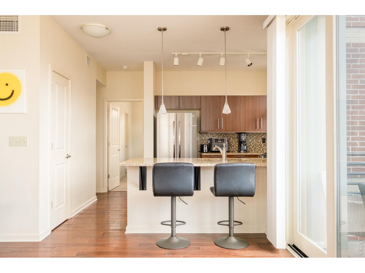 4555 13th Street, Unit 2A Boulder, CO 80304 - Photo 10 of 25 The spacious kitchen has a breakfast bar...