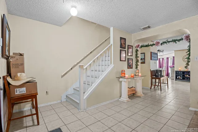 a view of entryway and workspace