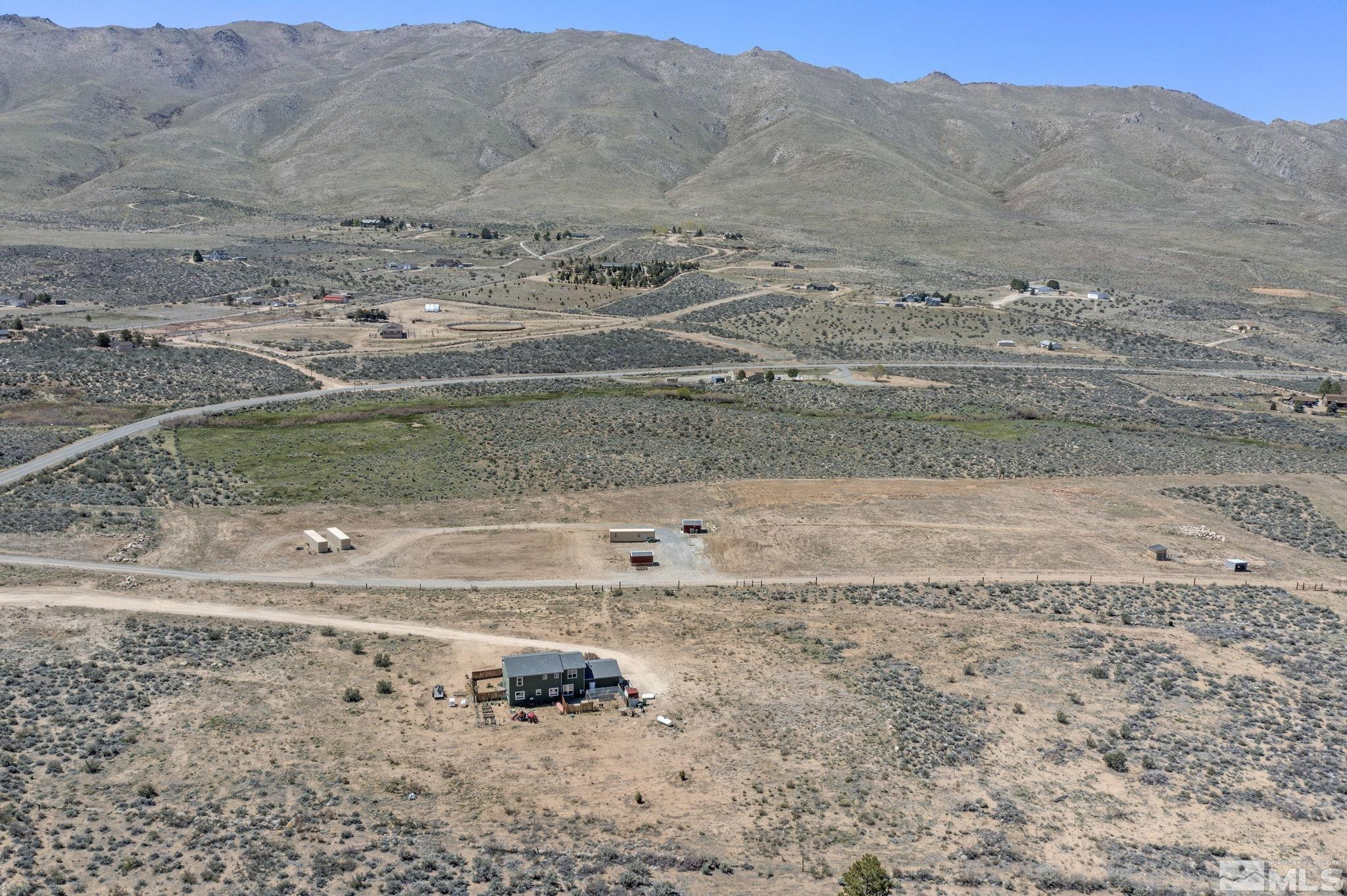 16100 North Red Rock Road Reno, NV 89508 - Photo 14 of 18 a view of a yard with a mountain