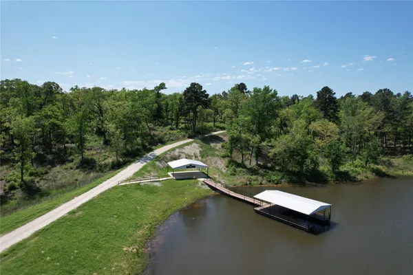 view of a lake with a city view