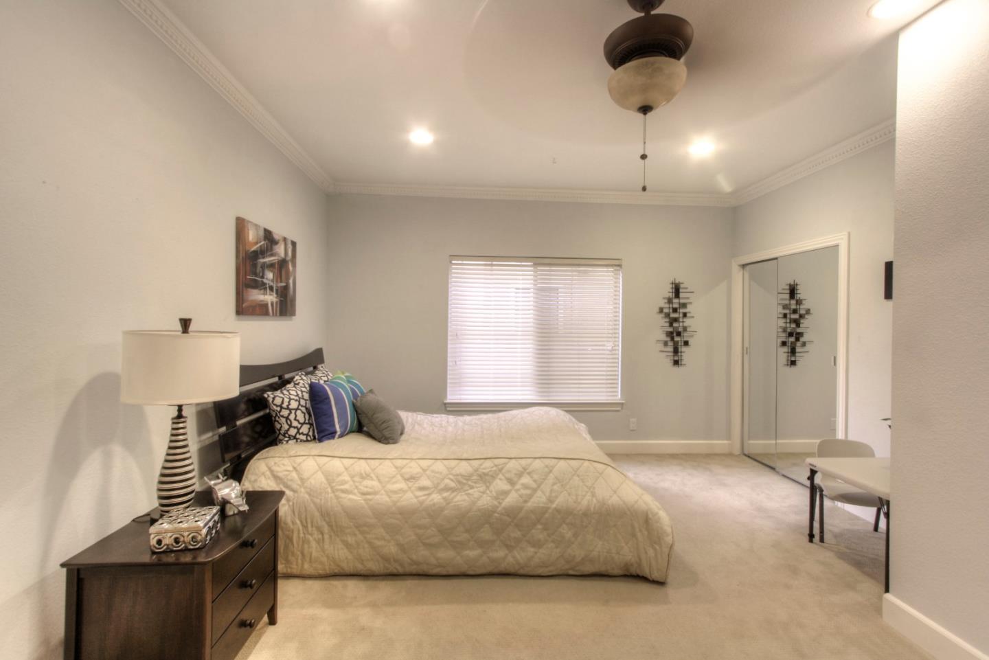 918 Boar Circle Fremont, CA 94539 - Photo 11 of 30 a bedroom with a bed and window