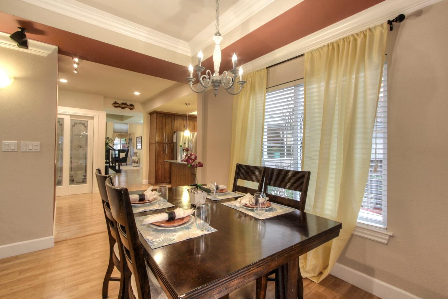 918 Boar Circle Fremont, CA 94539 - Photo 18 of 30 a view of a dining room with furniture window and wooden floor