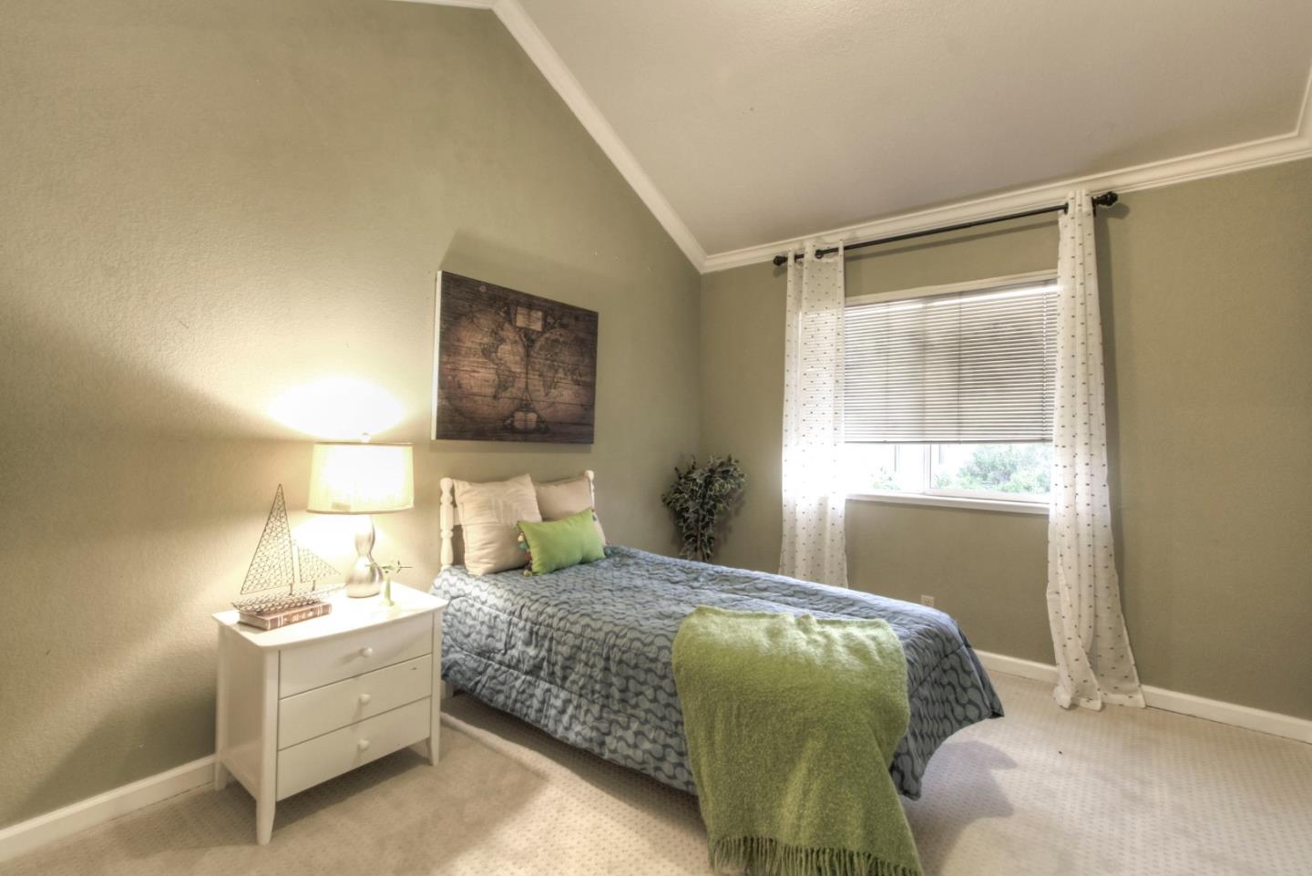 918 Boar Circle Fremont, CA 94539 - Photo 20 of 30 a bedroom with a bed and a window