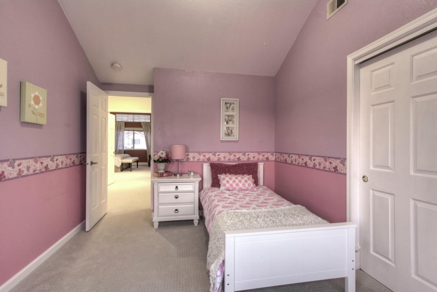 918 Boar Circle Fremont, CA 94539 - Photo 21 of 30 a bedroom with a bed and a dresser
