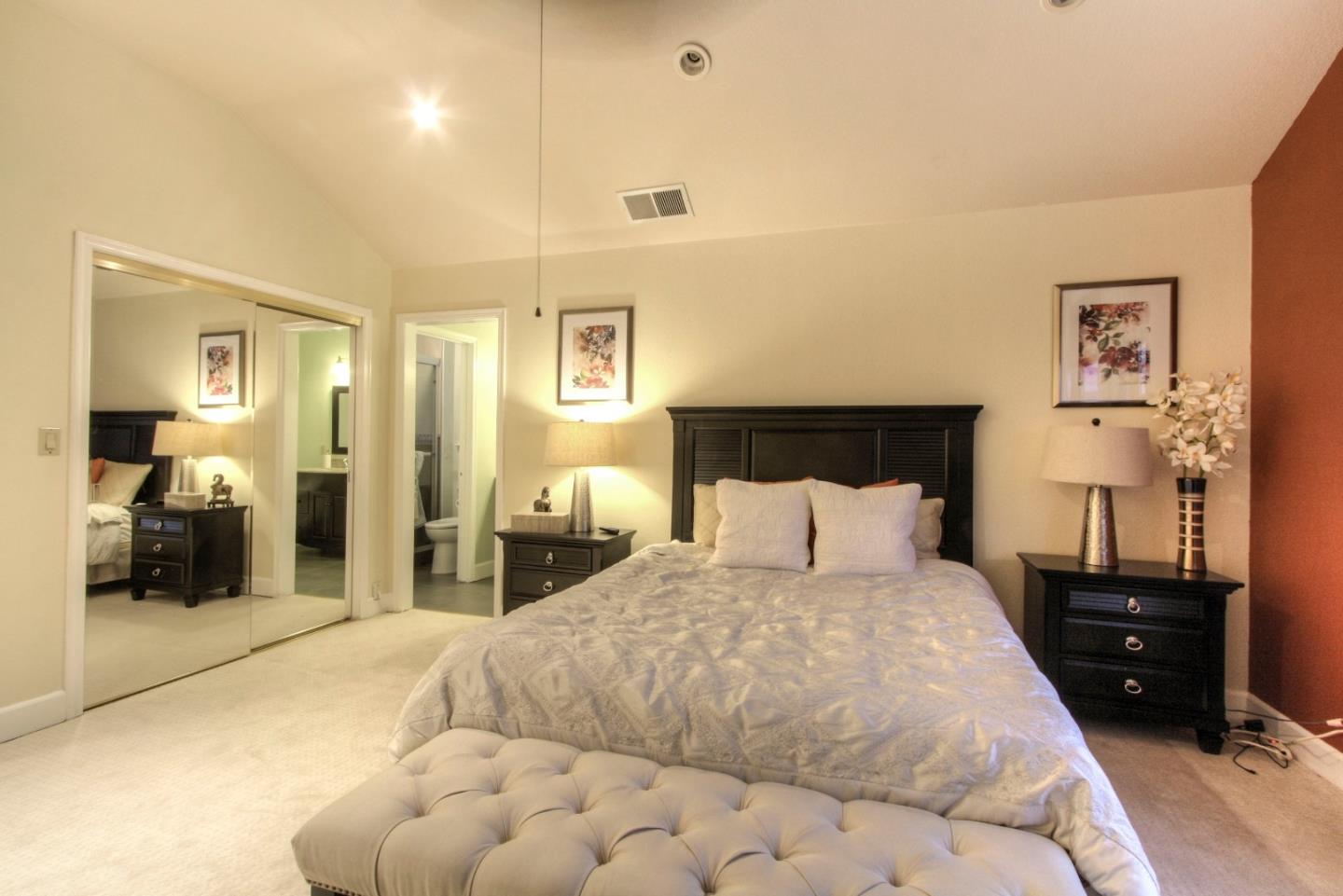 918 Boar Circle Fremont, CA 94539 - Photo 24 of 30 a bedroom with a bed and a couch