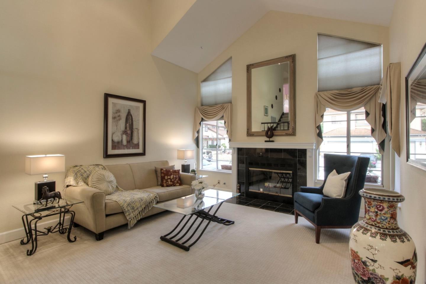 918 Boar Circle Fremont, CA 94539 - Photo 3 of 30 a living room with furniture and a fireplace