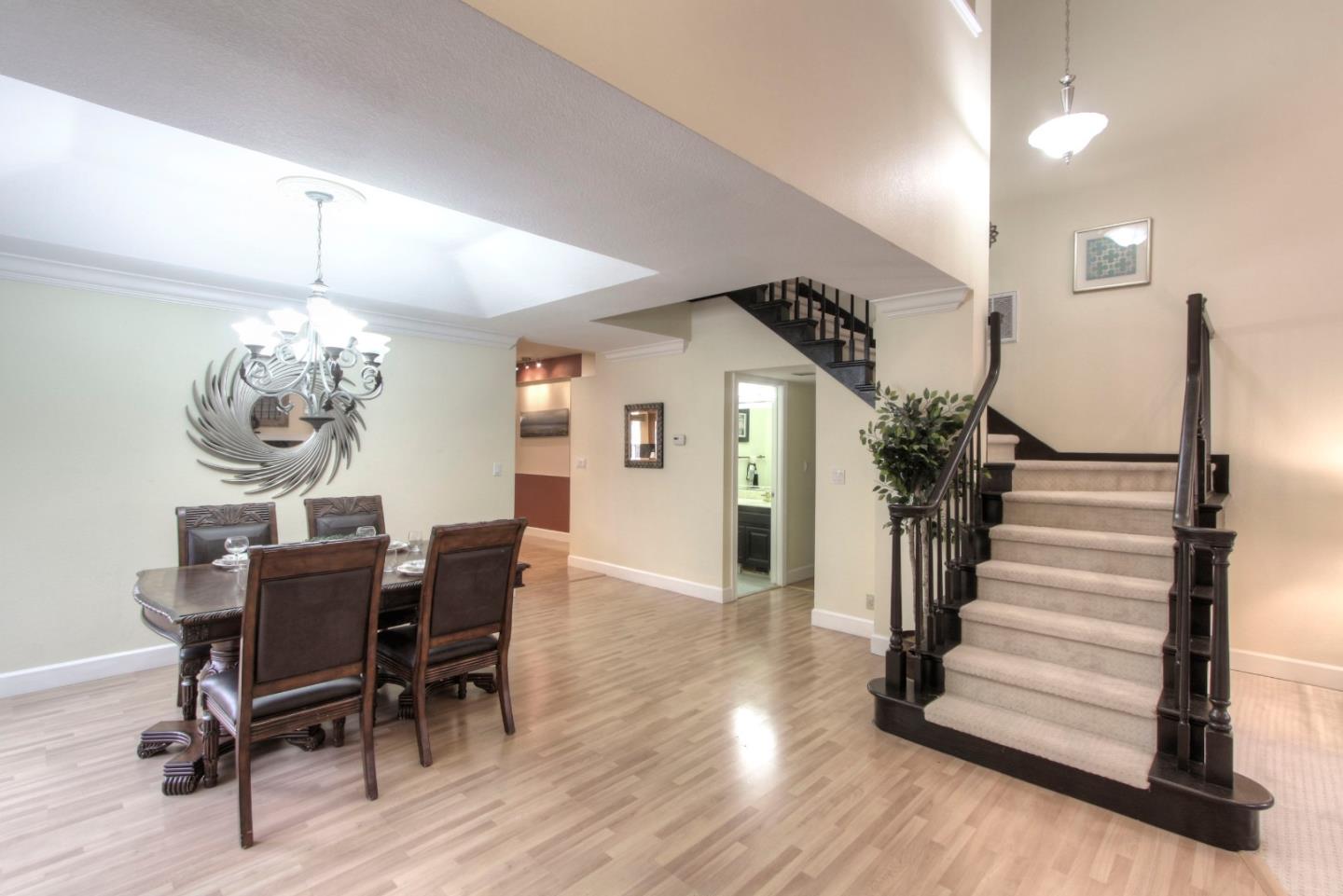 918 Boar Circle Fremont, CA 94539 - Photo 7 of 30 a view of a dining room with furniture and wooden floor