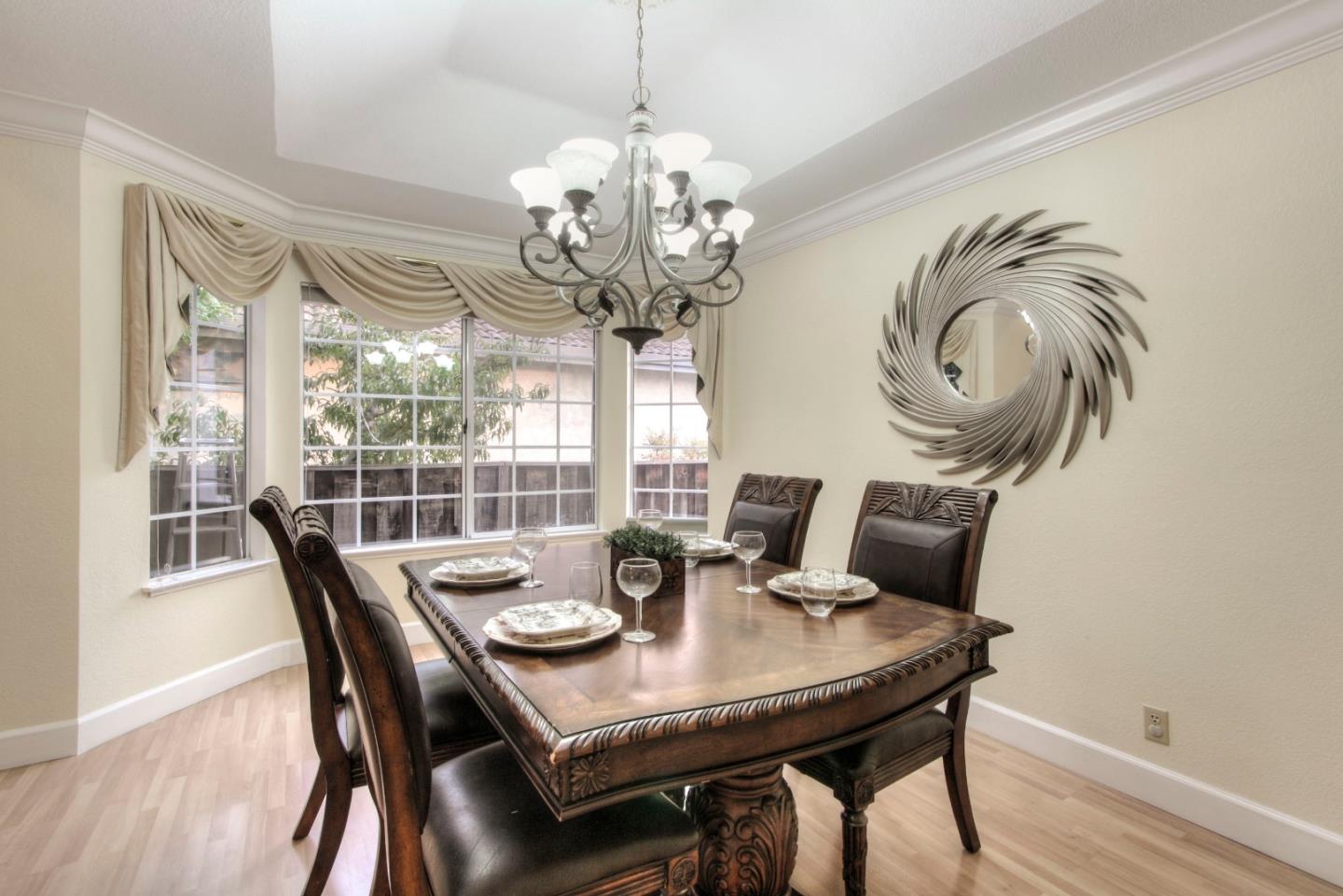 918 Boar Circle Fremont, CA 94539 - Photo 9 of 30 a view of a dining room with furniture window and wooden floor