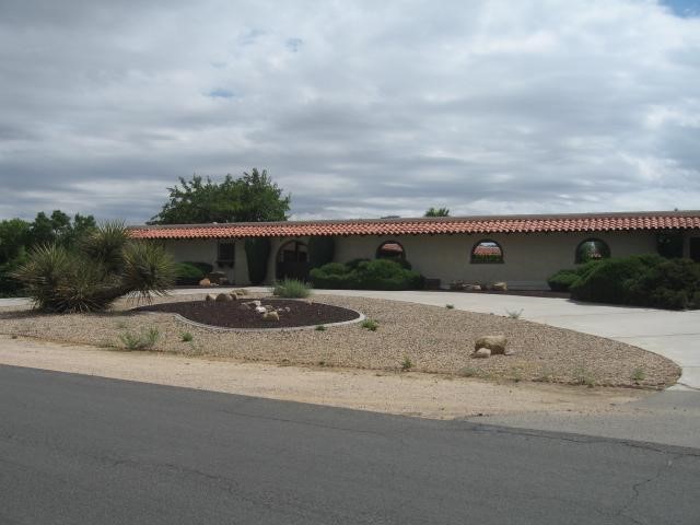 14795 Tigertail Road Apple Valley, CA 92307 - Photo 1 of 1 a view of a terrace with yard