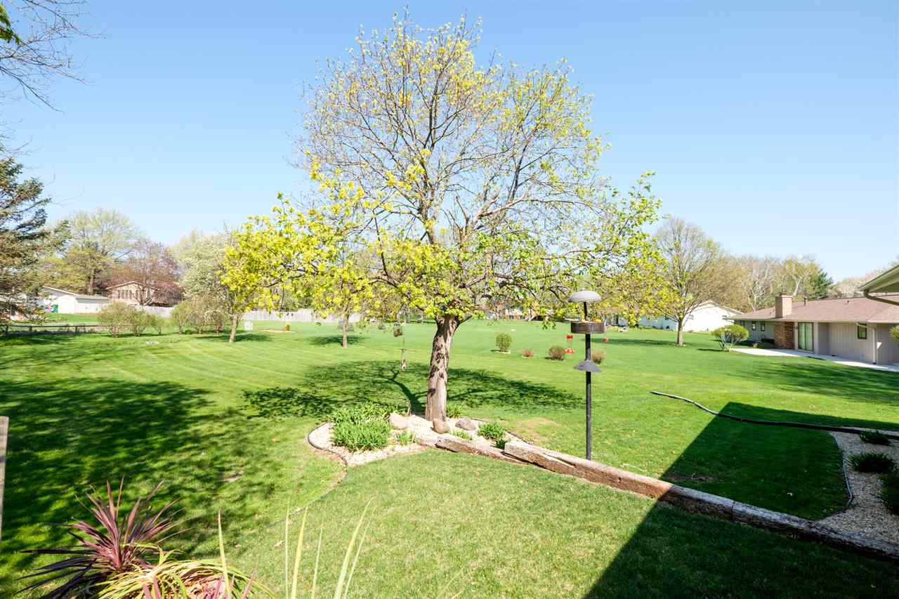 8211 Clockview Road Rockford, IL 61108 - Photo 24 of 25 a view of a park with large trees