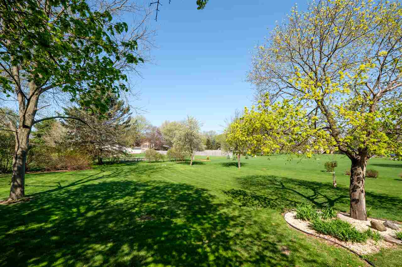 8211 Clockview Road Rockford, IL 61108 - Photo 25 of 25 a view of a lush green space