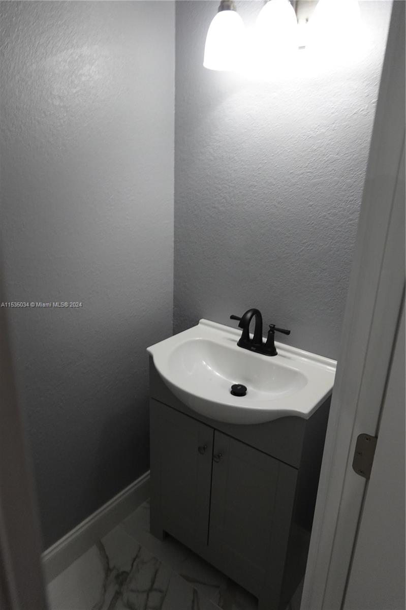 Townhouses at Jacaranda Condominiums Plantation, FL 33324 - Photo 12 of 50 a close up of a sink