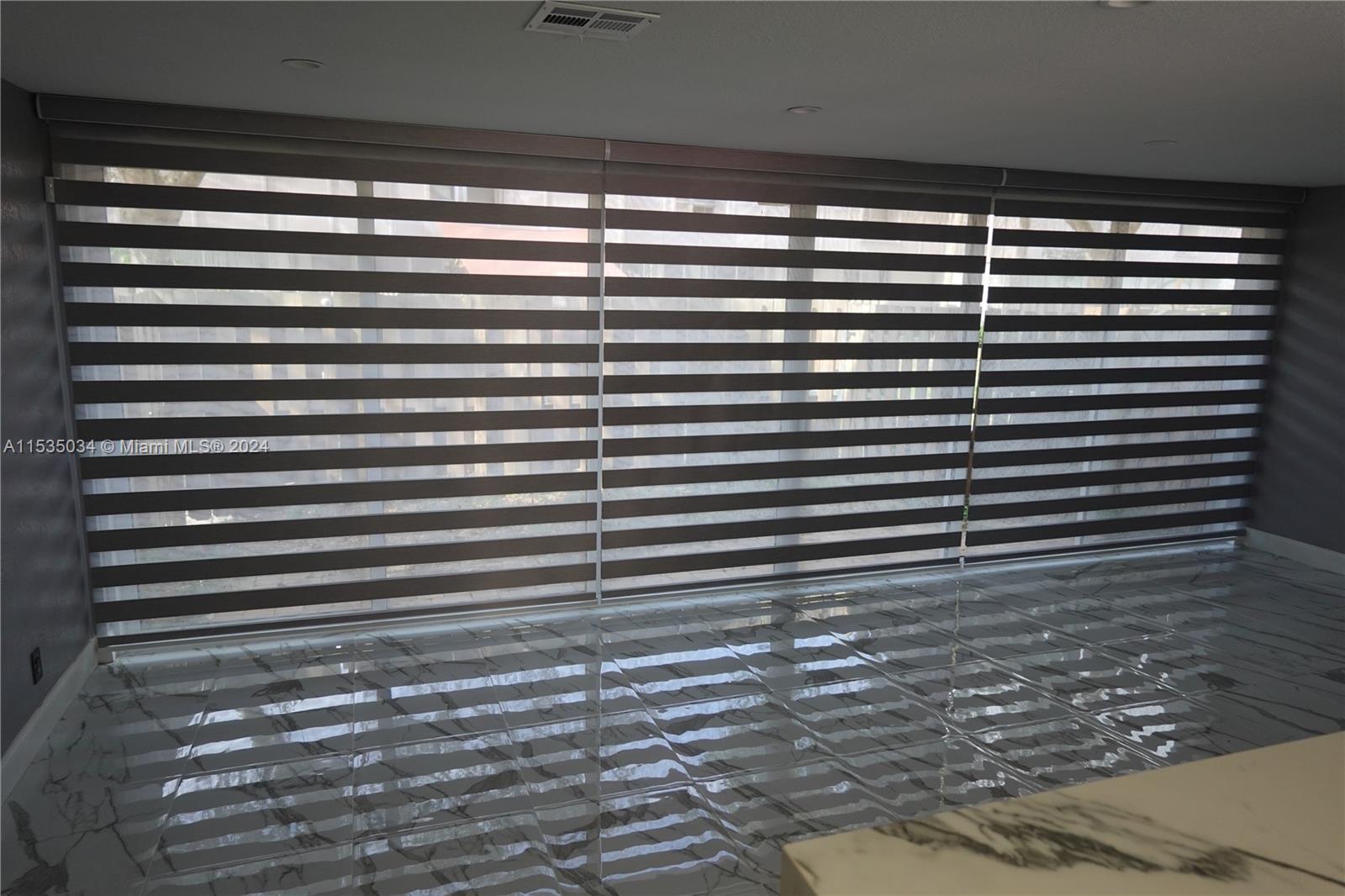 Townhouses at Jacaranda Condominiums Plantation, FL 33324 - Photo 19 of 50 a view of a room with a window