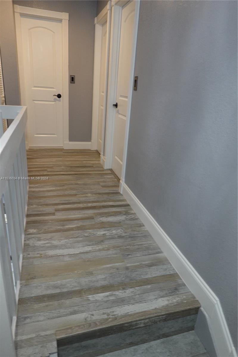 Townhouses at Jacaranda Condominiums Plantation, FL 33324 - Photo 22 of 50 a view of wooden door