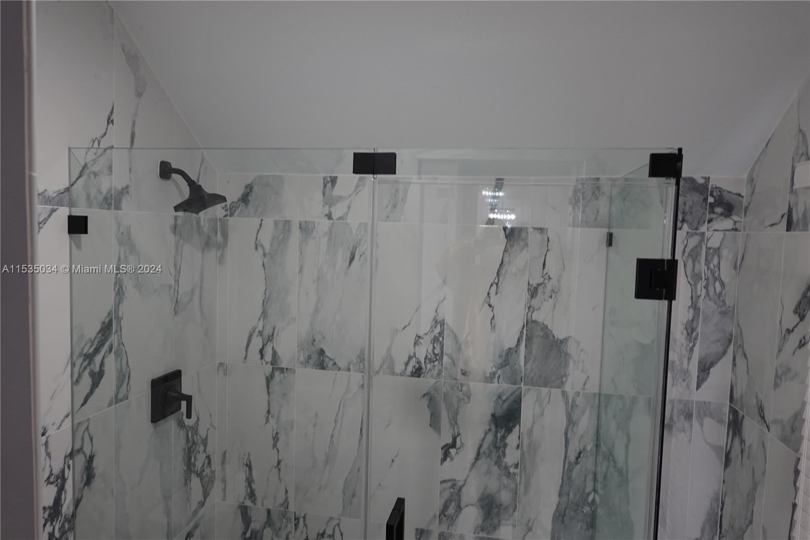 Townhouses at Jacaranda Condominiums Plantation, FL 33324 - Photo 36 of 50 a bathroom with a shower