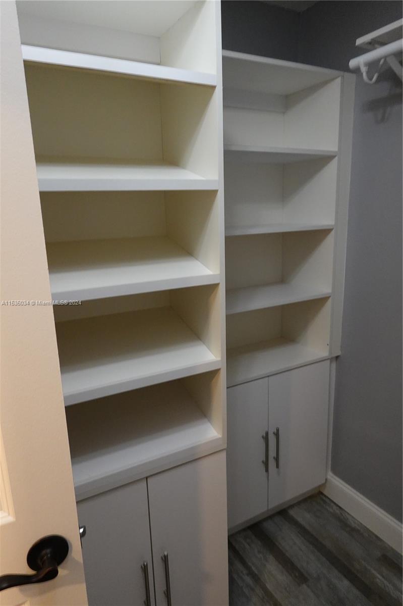 Townhouses at Jacaranda Condominiums Plantation, FL 33324 - Photo 47 of 50 a view of walk in closet with empty racks